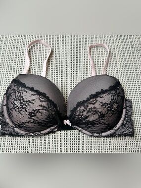 Victoria's Secret padded demi wire bra with black lace overlay and pink straps